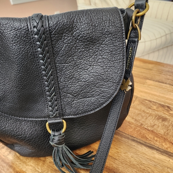 Lucky Brand black leather purse with magnetic tassle closure. It is 10"x10". - Picture 3 of 7